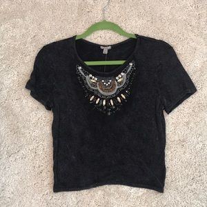 Distressed t shirt with neckline decoration